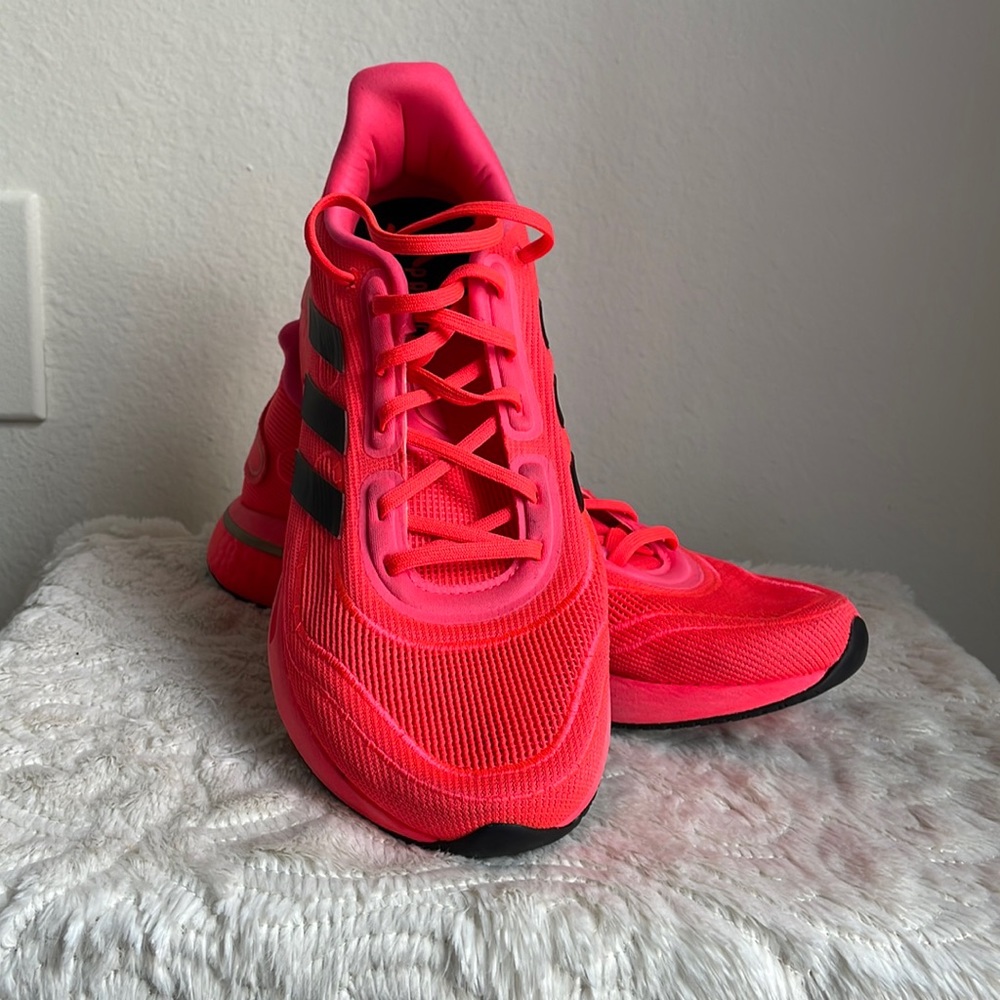 Adidas SuperNova Running shows Color Coral